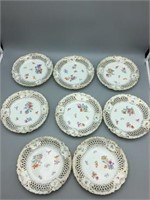 Set of eight German reticulated plates