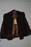 MINK CAPE WITH ORNATE BUTTONS