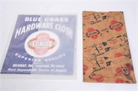 Blue Grass Cardboard Sign and Paper Bag