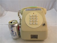 Téléphone d'hotel vintage a pièce de 25c