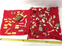 Various Native American artifacts, stones, + more.