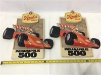 Two Stroh's Indy 500 advertising signs.