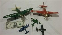 2 metal model airplanes and 3 miniature airplanes