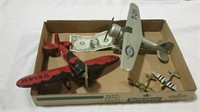 2 medium sized model metal airplanes and 2