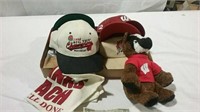 A variety of Wisconsin hats, bear and towels