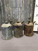 3 old gas cans