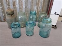 Assorted blue canning jars
