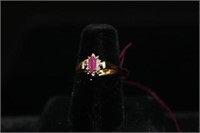 Ladies 14kt yellow gold Ruby Ring w/ 1 marquis