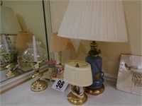3 lamps with shades and candle holder
