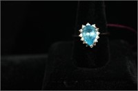 Ladies 14kt white gold Blue Topaz & Diamond Ring