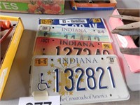 4 IN license plates, years vary from 1998-2015