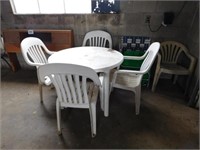 Plastic patio table with 4 chairs - 1 webbed lawn