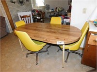 Kitchen table with 4 retro chairs on rollers,