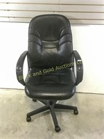 Black leather rolling office chair