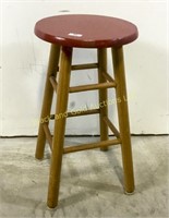 Wooden stool with painted seat