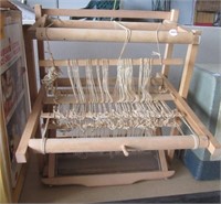 Table top weaving machine. Measures 20" h x 18" w