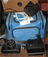 Minolta X-370 camera with manual, bag and many