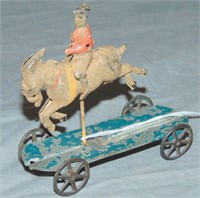 Man on Goat, Penny Toy