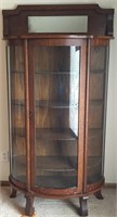 Curved front curio cabinet