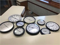 (9) battery operated wall clocks