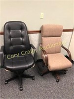 Pair of executive office chairs on casters