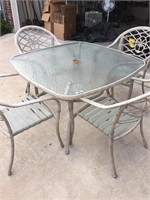 Lot of outdoor table and four chairs