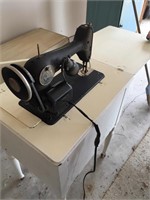 Singer sewing machine and sewing table