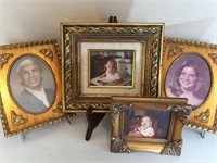 Lot of four gold wall frames, easels not included