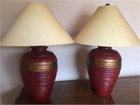 Lot of two red and gold tone large lamps