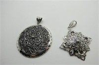 TWO STERLING SILVER INDIAN PENDANTS