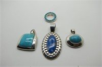 FOUR STERLNG TURQUOISE PENDANTS