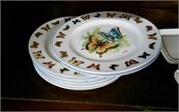 Stack of 7 Butterfly plates