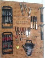 CONTENTS OF GARAGE CABINET AND ADJACENT PEGBOARD