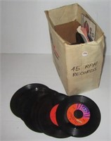 Box of various 45 RPM records including Bob