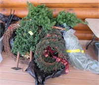 Large group of Christmas wreaths, small trees and