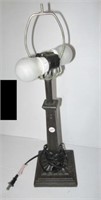 Metal table lamp. Measures 20" tall. Note: No