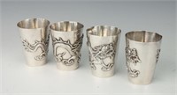 FOUR CHINESE EXPORT SILVER SHOT GLASSES