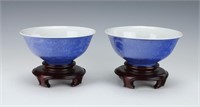 PAIR OF BLUE DRAGON BOWLS ON WOODEN STANDS