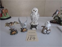 4 porcelian Figurines
