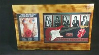 Photographs of Rolling Stones on wooden plaque