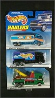 Three Brand New Hotwheels Haulers Trucks