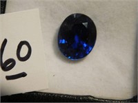 Faceted Oval blue sapphire gemstone   11 mm long