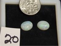 Pair of Oval opal gemstones - both 9 mm long -