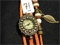 Leather & cord decorates this quartz watch - fun