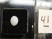 Beautiful Opal Gemstone with fire   8 mm long