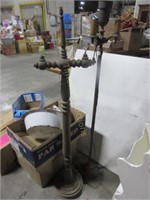 Old metal floor lamp and old wooden lamp