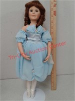 Melanie doll by Middleton on stand