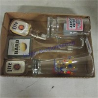 Beer tap toppers, glasses