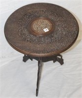 Round handcarved walnut Table w/ mother of pearl