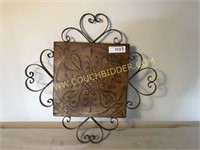 Large decorative metal wall plaque